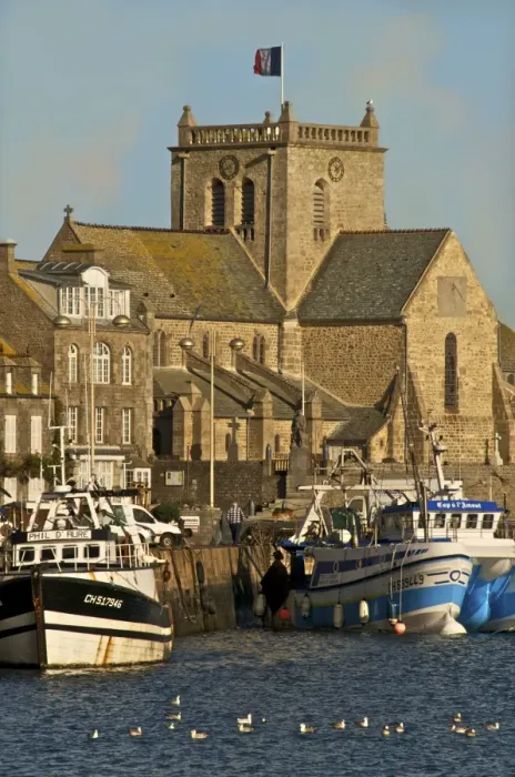 Framed Print : Harbour and fishing boats with houses and church in the background, Barfleur Framed Print : Harbour and fishing boats with houses and church in the background, Barfleur