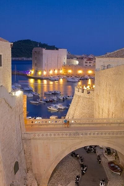 Harbour and Old City Walls at dusk, UNESCO World Heritage Site, Dubrovnik, Dalmatia, Croatia, Europe