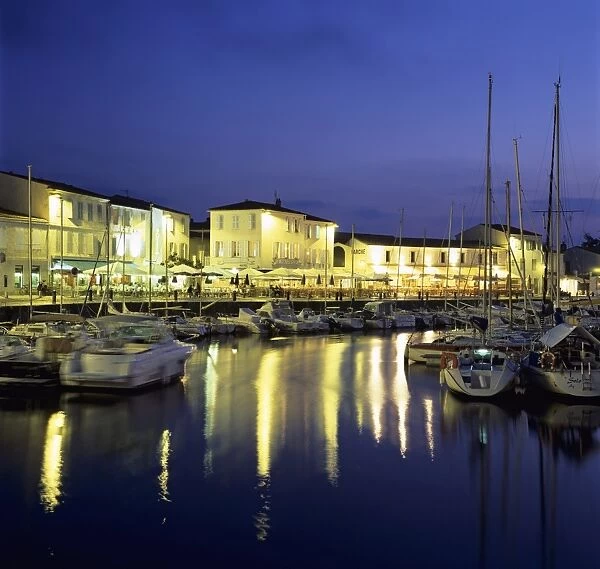 The harbour with restaurants at dusk, St. Martin, Ile de Re, Poitou-Charentes, France, Europe