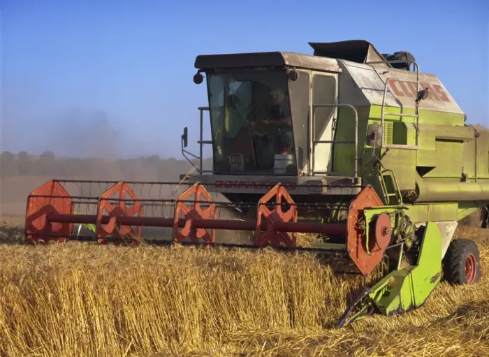 Framed Print : Harvester harvesting a barley field, Galilee, Israel, Middle East