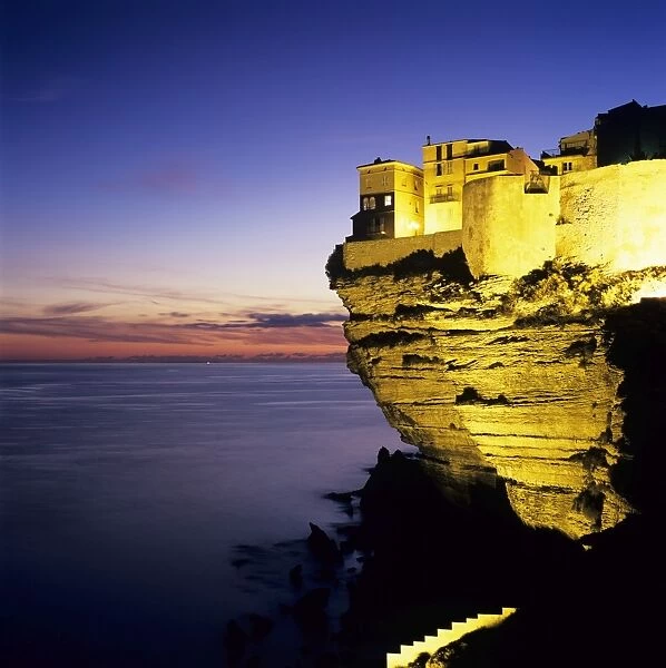 Haute Ville on cliff edge at dusk, Bonifacio, South Corsica, Corsica, France, Mediterranean, Europe