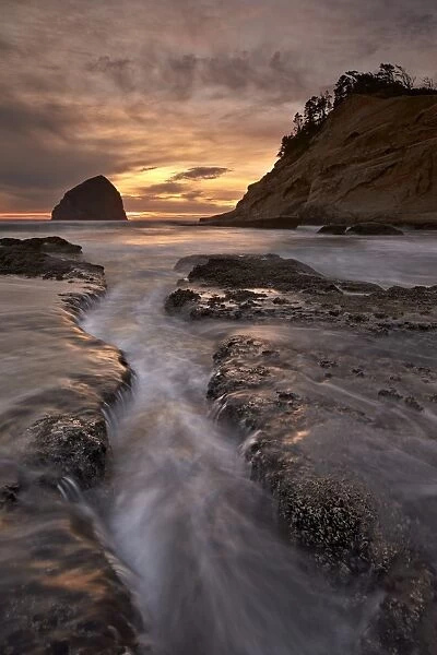 Haystack Rock at sunset, Pacific City, Oregon, United States of America, North America