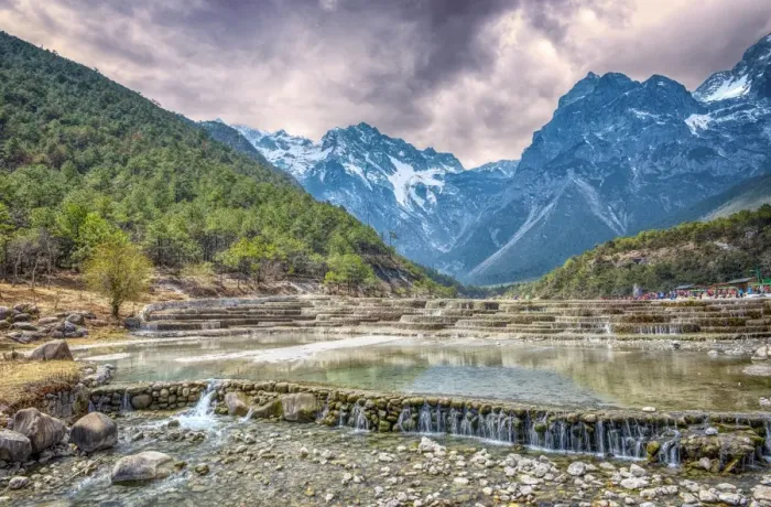 Framed Print : HDR image of cascading falls at Baishuihe, or White Water River with Jade Dragon Snow Mountain, Lijiang, Yunnan, China, Asia Framed Print : HDR image of cascading falls at Baishuihe, or White Water River with Jade Dragon Snow Mountain, Lijiang, Yunnan, China, Asia