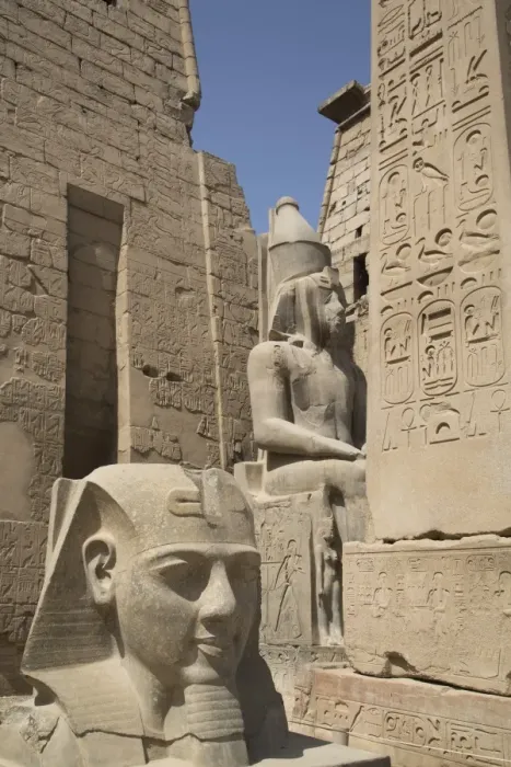Framed Print : Head of Ramses II in foreground and Colosssus of Ramses II behind, Luxor Temple, Luxor Framed Print : Head of Ramses II in foreground and Colosssus of Ramses II behind, Luxor Temple, Luxor