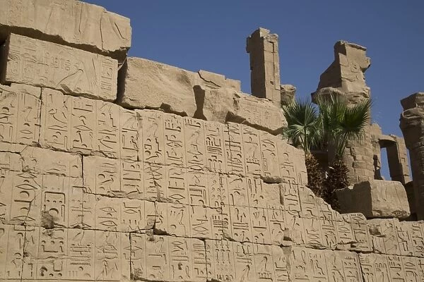 Hierogylphics on wall opposite Cachette Court, Karnak Temple, Luxor, Thebes, UNESCO