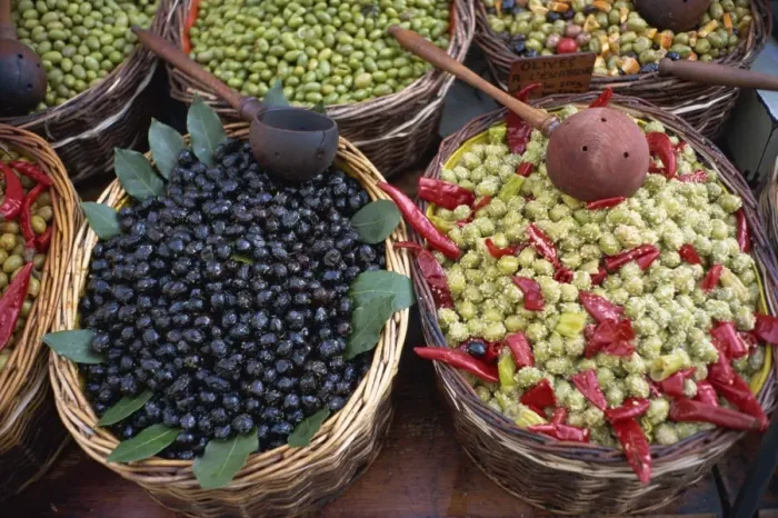 Framed Print : High angle view of baskets of black and green olives on a stall in the market Framed Print : High angle view of baskets of black and green olives on a stall in the market