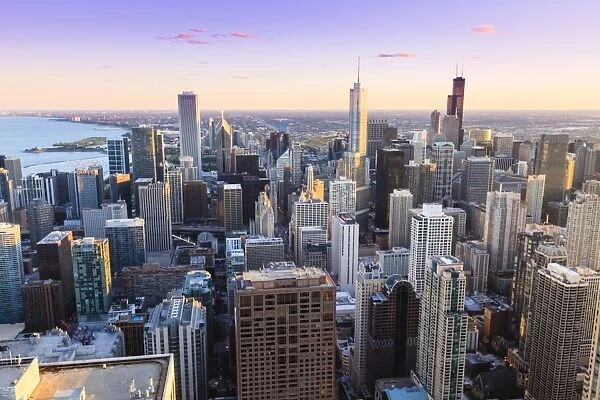 High angle view of Chicago skyline and suburbs looking south in the late afternoon, Chicago, Illinois, United States of America, North America