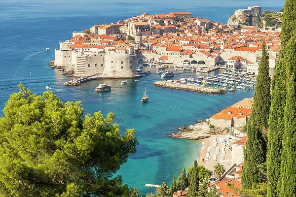 High-angle view over the old town of Dubrovnik and Banje Beach, Dubrovnik, Croatia