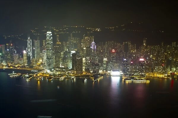 High view of the Hong Kong Island skyline and Victoria Harbour at night, Hong Kong, China, Asia