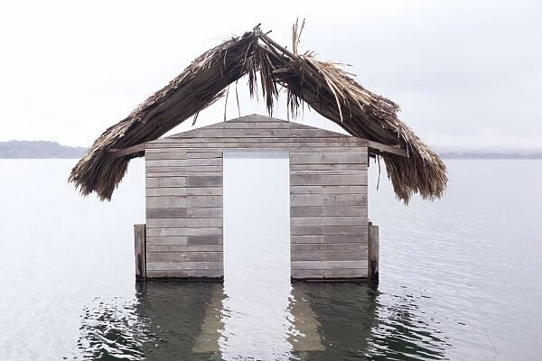 High water floods lakeside cabanas, Climate Change, Lago Peten Itza, Guatemala, Central America