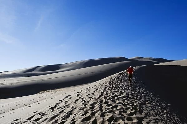 Hiker at Great Sand Dunes National Park, Colorado, United States of America