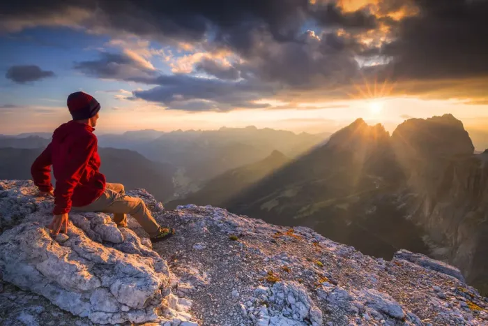 Framed Print : Hiker looks sunset from Piz Pordoi. Fassa Valley, Trentino, Dolomites, Italy, Europe Framed Print : Hiker looks sunset from Piz Pordoi. Fassa Valley, Trentino, Dolomites, Italy, Europe