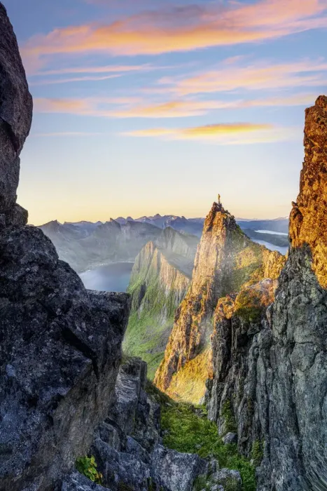 Framed Print : Hiker man admiring sunrise standing on top of Husfjellet mountain, Senja, Troms county Framed Print : Hiker man admiring sunrise standing on top of Husfjellet mountain, Senja, Troms county