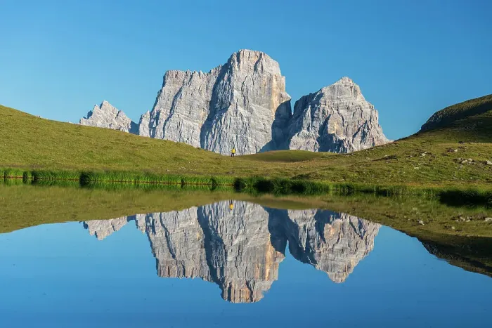 Framed Print : Hiker and Mount Pelmo reflected in the water of Baste Lake on a sunny day, Belluno Dolomites, Belluno province, Veneto, Italy, Europe Framed Print : Hiker and Mount Pelmo reflected in the water of Baste Lake on a sunny day, Belluno Dolomites, Belluno province, Veneto, Italy, Europe
