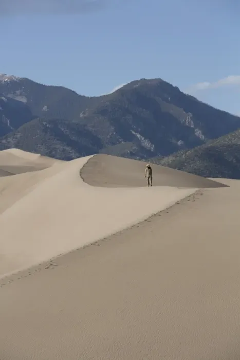 Framed Print : Hiker on the sand dunes, Great Sand Dunes National Park and Preserve, with Sangre Cristo Mountains in the background, Colorado, United States of America, North America Framed Print : Hiker on the sand dunes, Great Sand Dunes National Park and Preserve, with Sangre Cristo Mountains in the background, Colorado, United States of America, North America