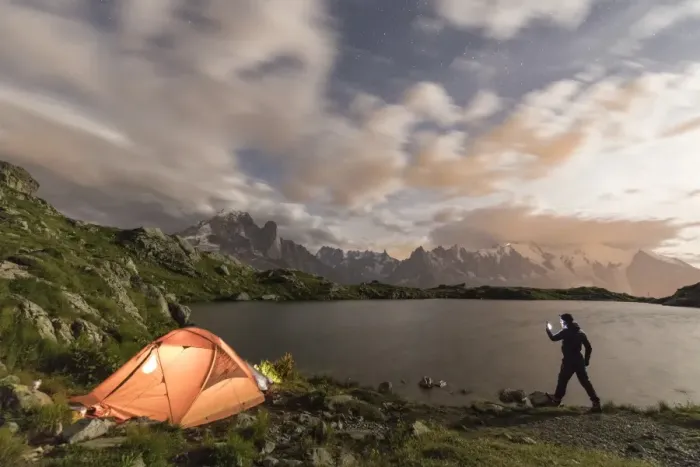 Framed Print : Hiker and tent on the shore of Lacs De Cheserys at night with Mont Blanc massif in background Framed Print : Hiker and tent on the shore of Lacs De Cheserys at night with Mont Blanc massif in background