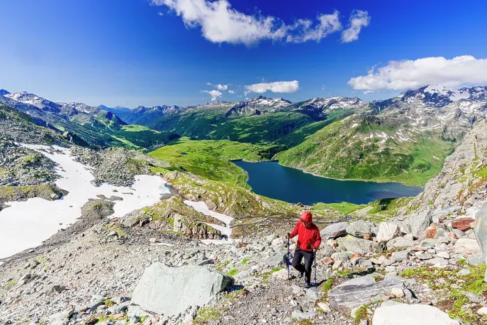 Framed Print : Hiker walking on mountain ridge above the blue lake Montespluga, Madesimo, Valle Spluga, Valtellina, Lombardy, Italy, Europe Framed Print : Hiker walking on mountain ridge above the blue lake Montespluga, Madesimo, Valle Spluga, Valtellina, Lombardy, Italy, Europe