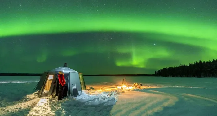 Framed Print : Hiker watching the Aurora Borealis (Northern Lights) close to bonfire and igloo in the frozen landscape, Jokkmokk, Lapland, Sweden, Scandinavia, Europe Framed Print : Hiker watching the Aurora Borealis (Northern Lights) close to bonfire and igloo in the frozen landscape, Jokkmokk, Lapland, Sweden, Scandinavia, Europe