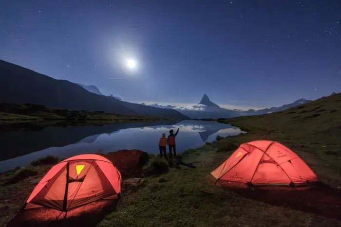 Framed Print : Hikers admire Matterhorn reflected in Lake Stellisee on a starry night of full moon Framed Print : Hikers admire Matterhorn reflected in Lake Stellisee on a starry night of full moon