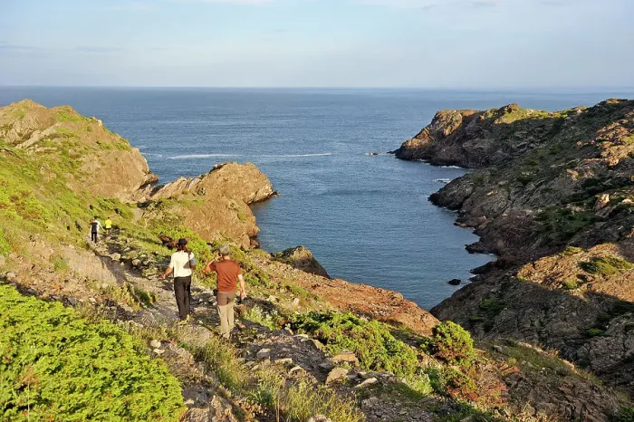 Framed Print : Hikers at Cala Fredosa creek, Cap Creus, Costa Brava, Catalonia, Spain, Europe