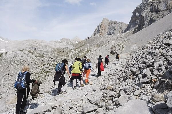 Hikers in Picos de Europa National Park, shared by the provinces of Asturias