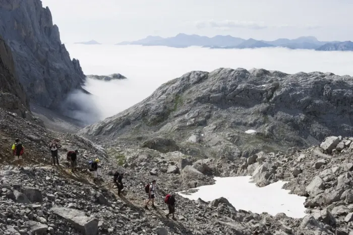 Framed Print : Hikers in the Picos de Europa National Park, shared by the provinces of Asturias