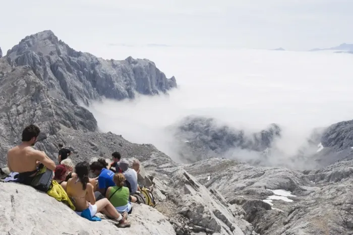 Framed Print : Hikers taking a break on Tesorero Peak, in Picos de Europa National Park Framed Print : Hikers taking a break on Tesorero Peak, in Picos de Europa National Park