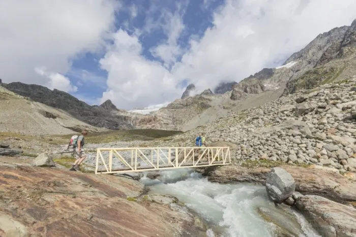 Framed Print : Hikers on walkway of the path Sentiero Glaciologico of Fellaria Glacier, Malenco Valley Framed Print : Hikers on walkway of the path Sentiero Glaciologico of Fellaria Glacier, Malenco Valley