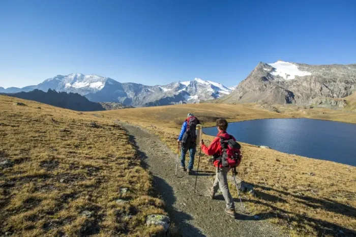 Framed Print : Hikers wallking along Rosset Lake, Gran Paradiso National Park, Alpi Graie (Graian Alps) Framed Print : Hikers wallking along Rosset Lake, Gran Paradiso National Park, Alpi Graie (Graian Alps)