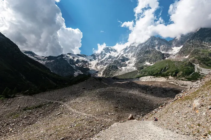 Framed Print : Hiking trail in alpine landscape facing Monte Rosa with moraine landscape, Italian Alps, Italy, Europe Framed Print : Hiking trail in alpine landscape facing Monte Rosa with moraine landscape, Italian Alps, Italy, Europe