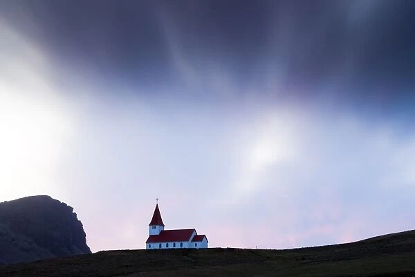 Hilltop church against twilight sky, Vik i Myrdal, southern area, Iceland, Polar Regions
