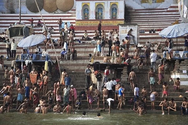Hindu pilgrims take part in ritual bathing, Ganges River, Varanasi, Uttar Pradesh