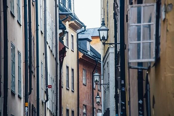 Historic and colorful buildings in Hells Alley, Gamla Stan, Stockholm, Sweden, Scandinavia