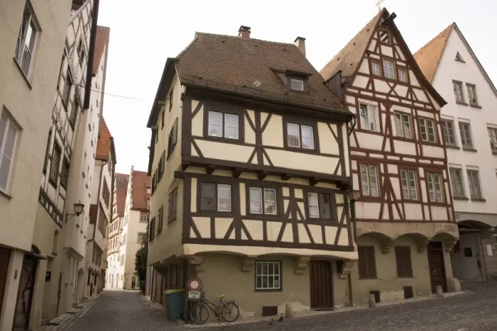 Framed Print : Historic half-timbered houses typical of the city stand close to the Meztgerturm in Ulm Framed Print : Historic half-timbered houses typical of the city stand close to the Meztgerturm in Ulm
