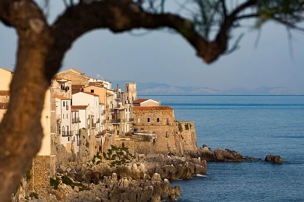 Historic houses on the rocky coastline of Cefalu, Sicily, Italy, Mediterranean, Europe