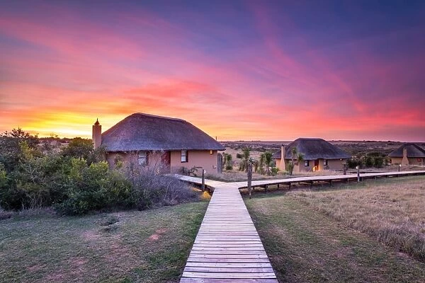 Hlosi Game Lodge during a spectacular sunset over the Amakhala Game Reserve on the Eastern Cape