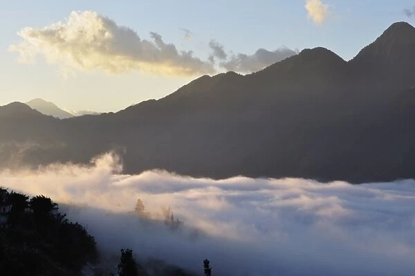 Hoang Lien Mountains and morning fog in Sapa Valley, Sapa, Vietnam, Indochina