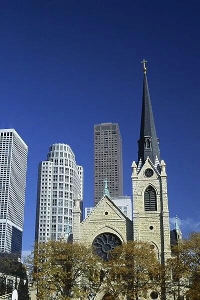Holy Name Christian cathedral and tower blocks of the