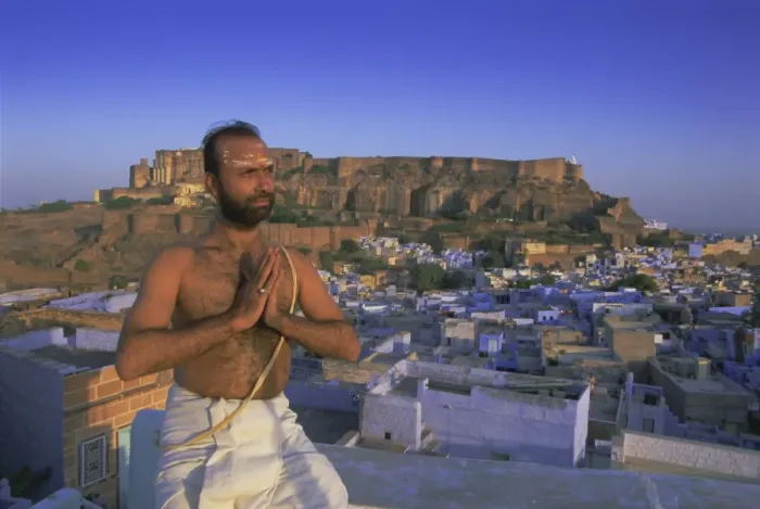 Framed Print : A holy man and the Blue city and fort Framed Print : A holy man and the Blue city and fort