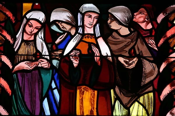 Holy virgins in the stained glass window of Saint-Joseph des Fins church, Annecy