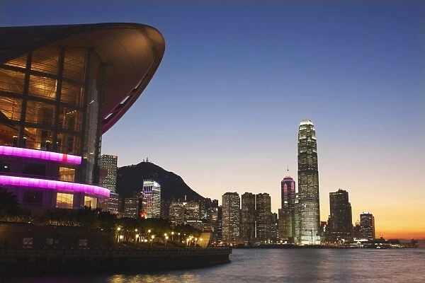 Hong Kong Convention and Exhibition Centre with IFC and skyscrapers in background