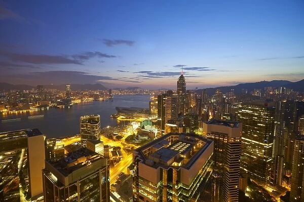 Hong Kong skyline just before sunrise looking from Hong Kong Island across Victoria