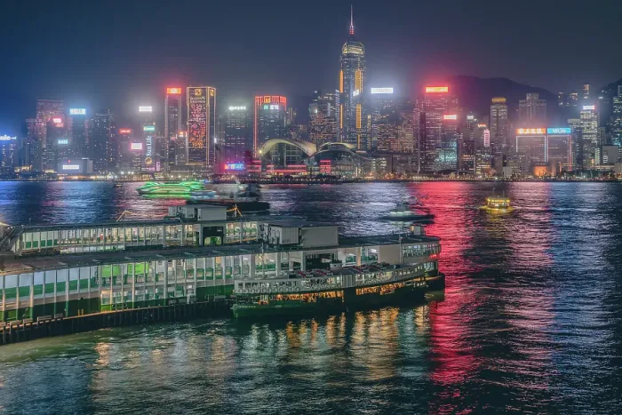 Framed Print : The Hong Kong Skyline at night with the Star Ferry terminal in the foreground, Hong Kong, China Framed Print : The Hong Kong Skyline at night with the Star Ferry terminal in the foreground, Hong Kong, China