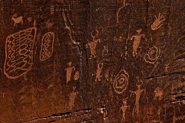 Horned anthropomorphs holding shields, Formative Period Petroglyphs, Utah Scenic Byway 279, Potash Road, Moab, Utah, United States of America, North America