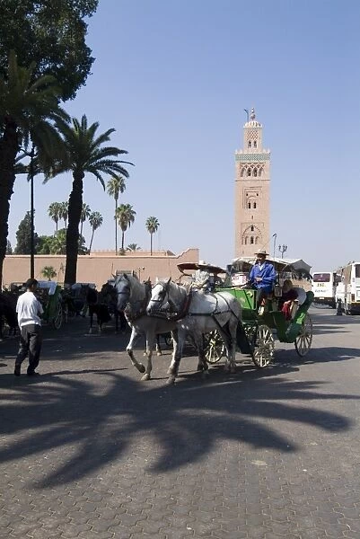 Horse and carriage near Jemaa el Fna with Koutoubia in background