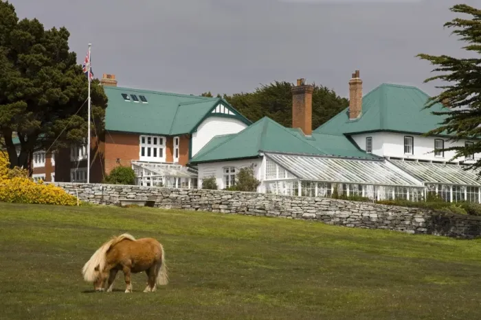 Framed Print : Horse and Goverment House in Port Stanley, Falkland Islands (Islas Malvinas) Framed Print : Horse and Goverment House in Port Stanley, Falkland Islands (Islas Malvinas)