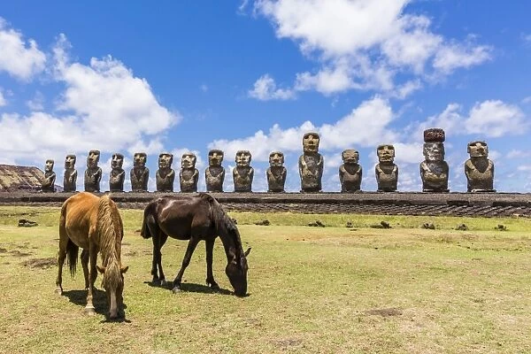 Horses grazing at the 15 moai restored ceremonial site of Ahu Tongariki on Easter Island (Isla de Pascua) (Rapa Nui), UNESCO World Heritage Site, Chile, South America