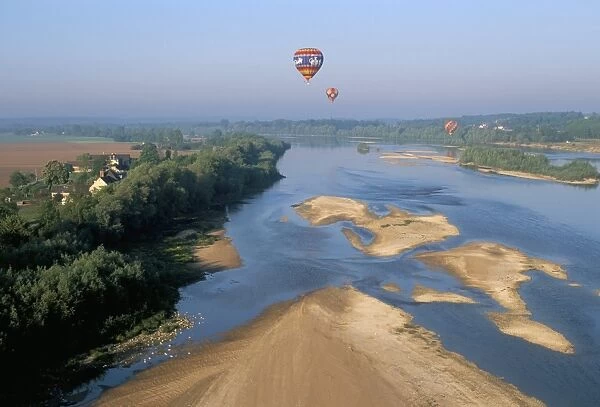 Hot air ballooning above the Loire River, Blois region, Pays de Loire, France, Europe