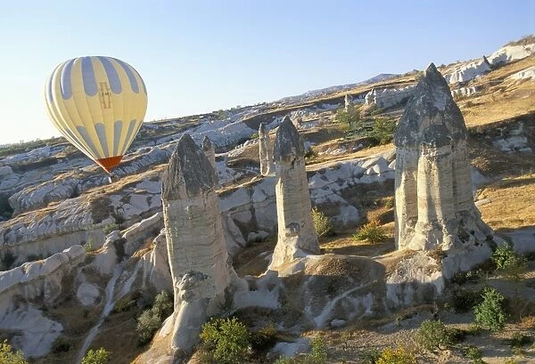Hot air ballooning over rock formations