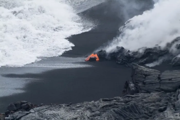 Framed Print : Hot lava flowing onto beach and into the ocean Framed Print : Hot lava flowing onto beach and into the ocean